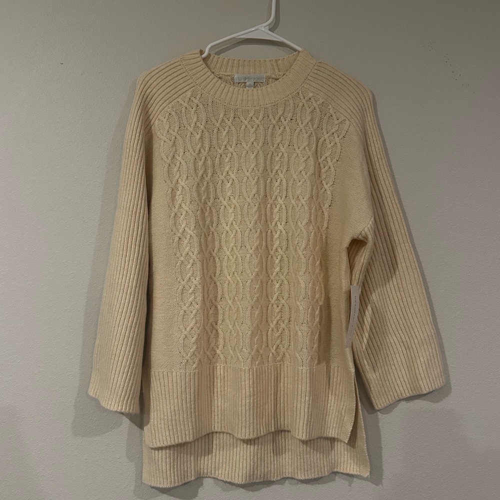 Design History sweater, in cream in an oversized small. Would fit a Large.